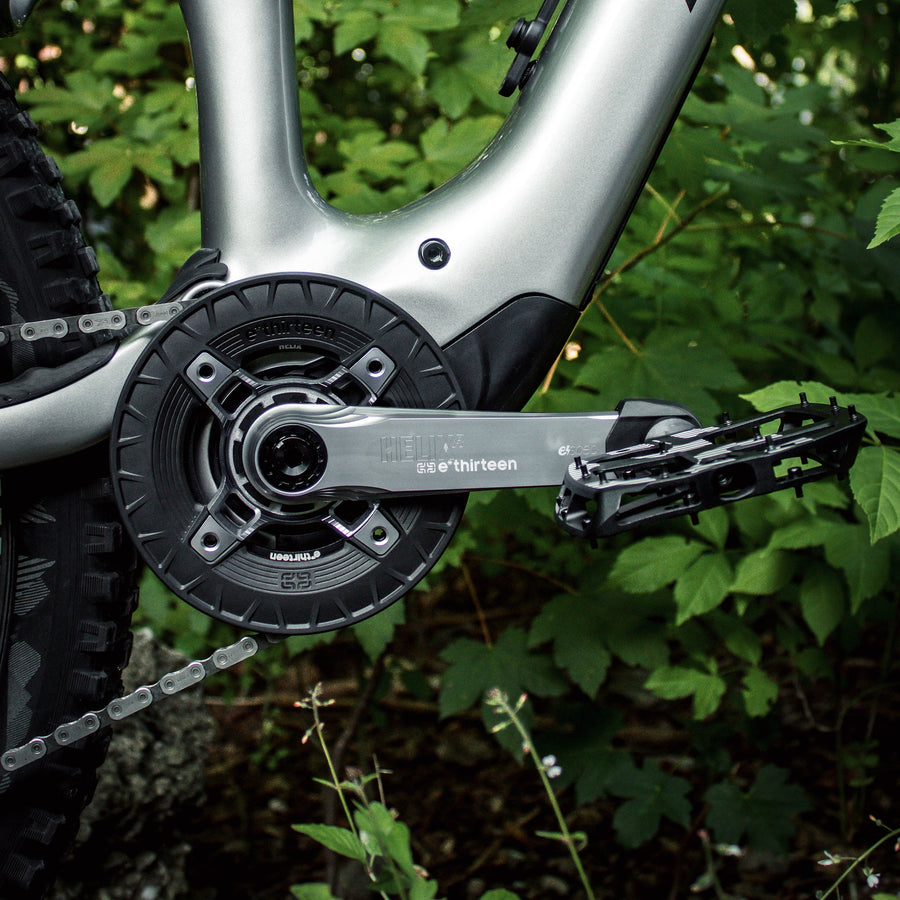 A Turbocharger Race bashguard and chainring fitted to an e-bike