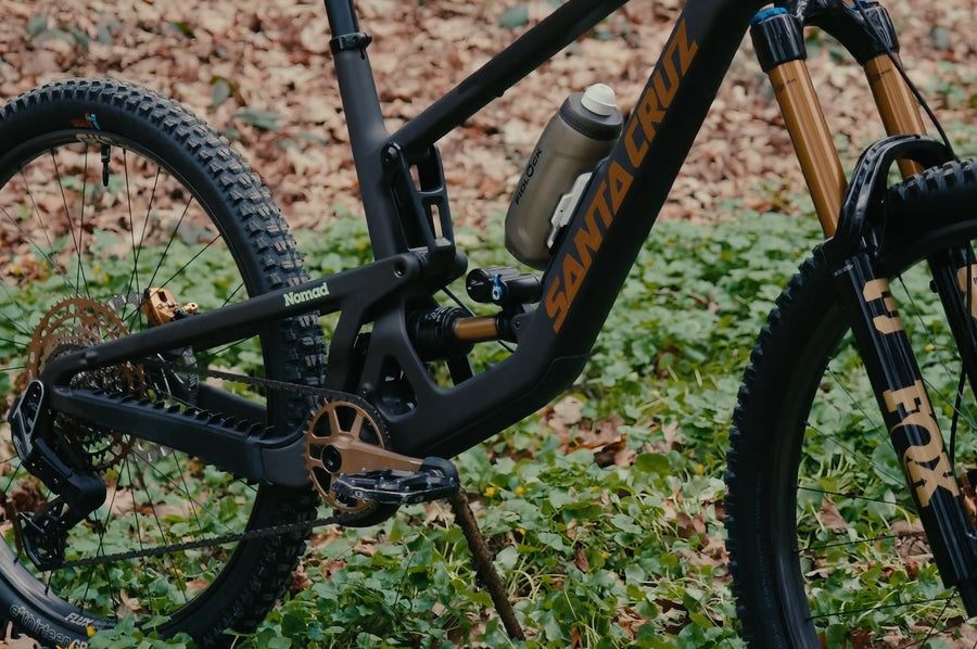 A freeride Nomad built almost entirely in bronze, on Sidekick Flux carbon wheels.