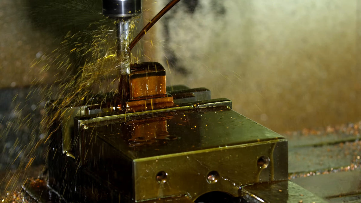 Electric discharge machining eroding a steel tire mold from a copper die in the spark department. Still from Freehub Magazine's film Made With Love.